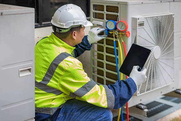 Professional Heat Pump Repair technician working in Woodlake, CA